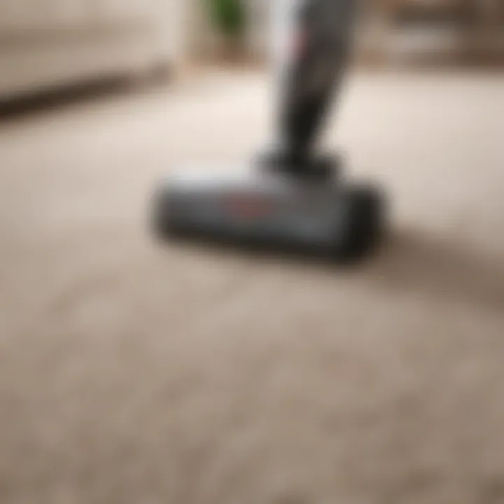 Bissell Icon Pet Stick Vacuum in action on carpet