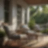 A beautifully arranged porch with stylish chairs overlooking a garden.