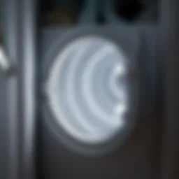 Clothes dryer with open door showing lint screen