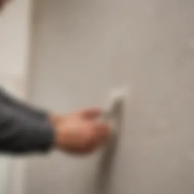 Demonstration of applying joint compound on Sheetrock