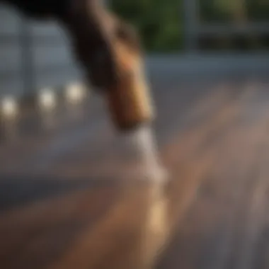 Demonstration of spray painting technique on a deck