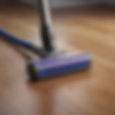 Dyson vacuum demonstrating powerful suction on hardwood floor