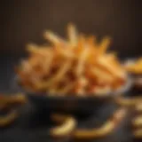 Golden brown air fried French fries in a bowl