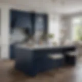 Elegant kitchen island in deep navy blue paired with sleek white cabinetry