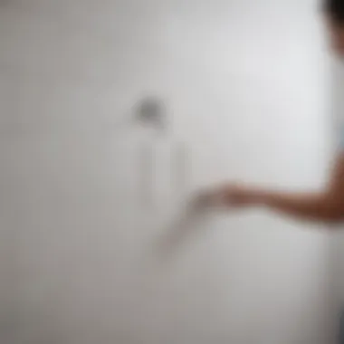The Art of Installing White Wall Tiles Installation of large white wall tiles in progress