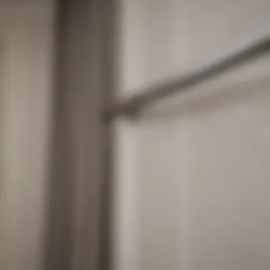 Modern no drill curtain rod installation on a door
