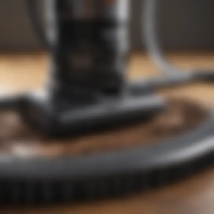 Close-up of the filter and dust container of a cordless vacuum.