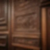 Elegant vintage wooden kitchen cabinet showcasing intricate carvings and warm tones.