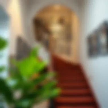 Gallery Style Staircase Photo Wall A creative staircase featuring a gallery of framed photos