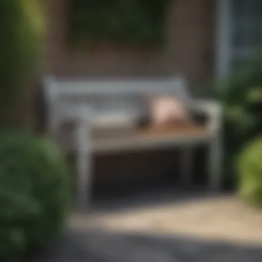 Elegant small bench on a cozy front porch surrounded by greenery