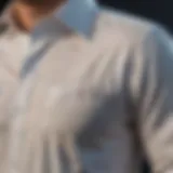 A close-up view of a shirt with fresh paint stains on it