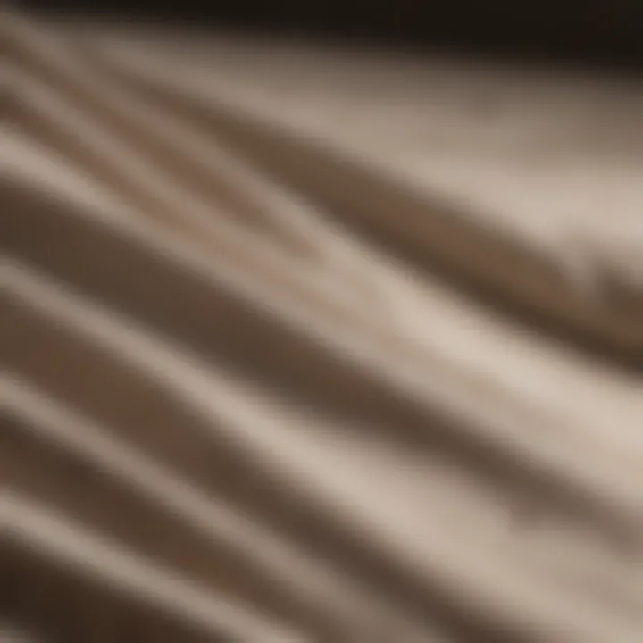 A close-up of fabric being treated with vinegar for stain removal