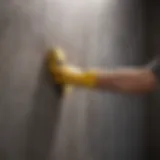 A pristine wall being cleaned with a sponge